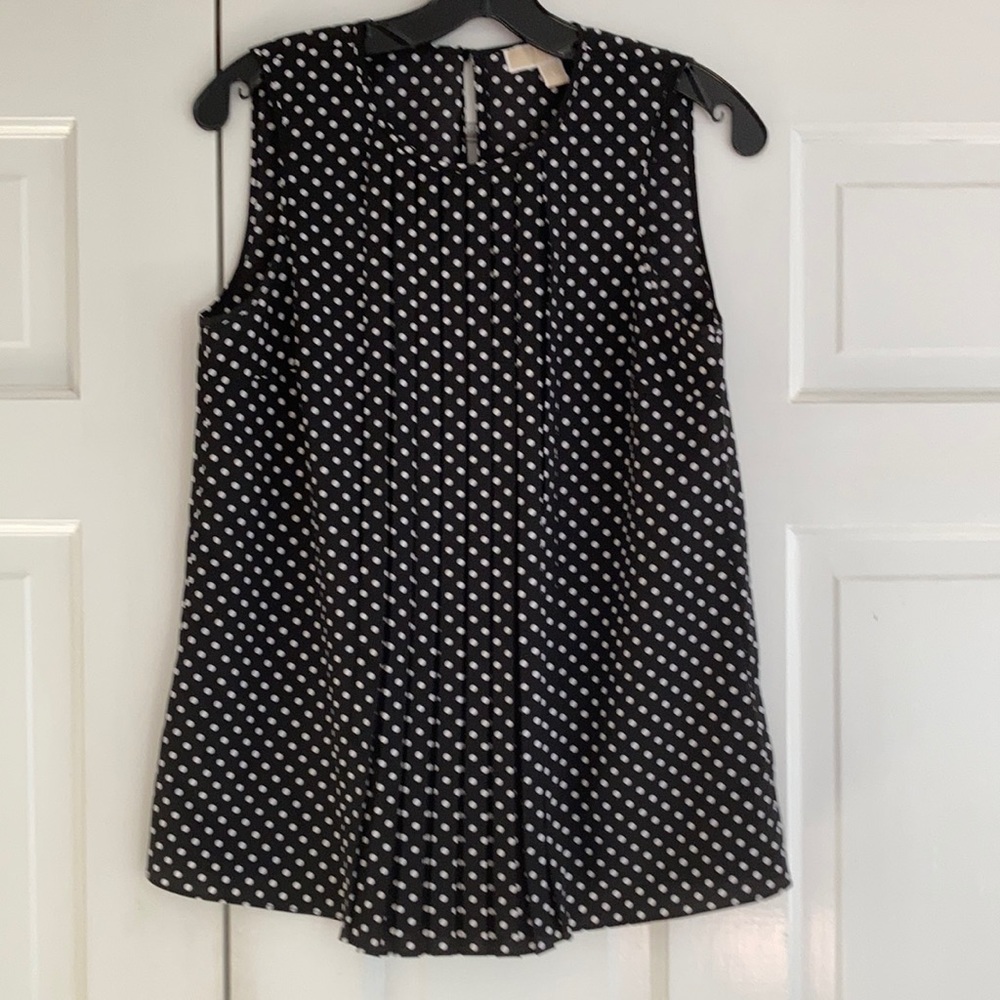 Micheal Kors short sleeve pleated front top.